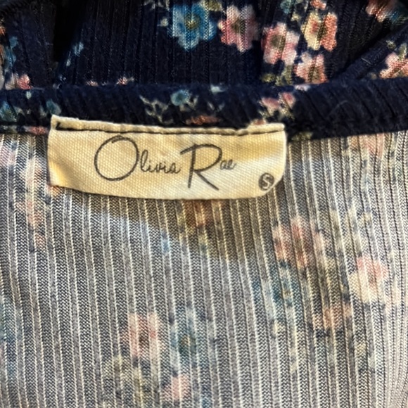 Navy blue tee with pink and blue flowers. - Picture 3 of 3